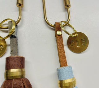 Tennis in the Land/CLE Tassle Keychains